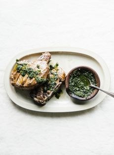 Grilled pork chops with garlic and kale relish