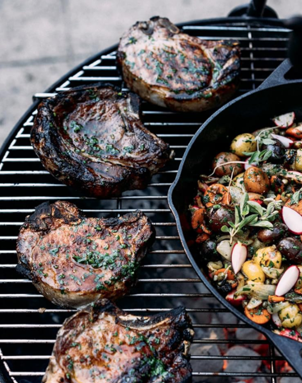 Grilled pork chops with herb butter