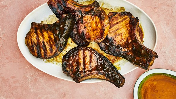 Grilled pork chops with pineapple-turmeric glaze
