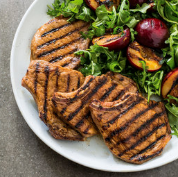 Grilled pork chops with plums