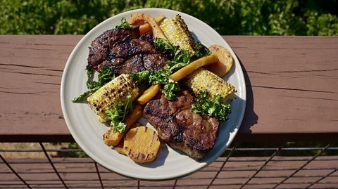 Grilled pork chops with Tennessee mopping sauce [and barbecued butternut squash, kale, and corn on the cob]