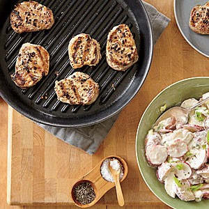 Grilled pork medallions with spicy potato salad