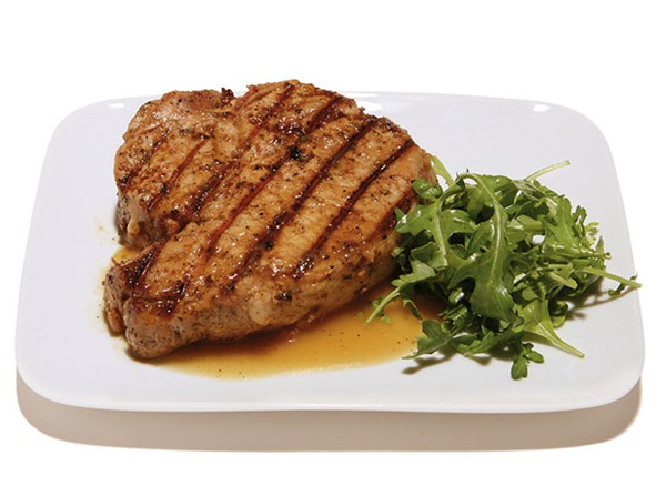 Grilled pork porterhouse with an apple-maple-ginger sauce