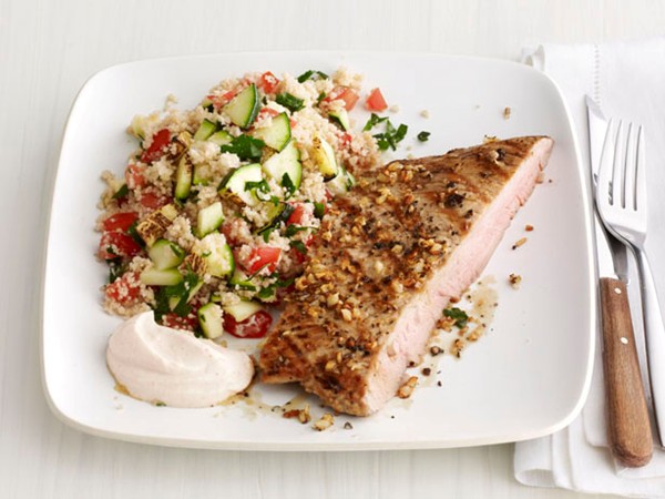 Grilled pork steaks with zucchini couscous