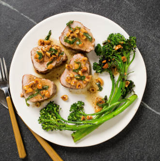Grilled pork tenderloin with broccolini and hazelnut browned butter