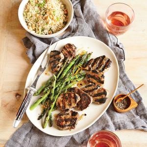 Grilled pork tenderloin with orange-sesame asparagus and rice