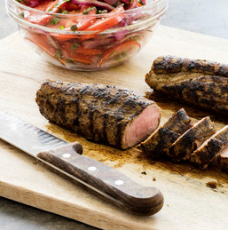 Grilled pork tenderloin with tomato-onion salad