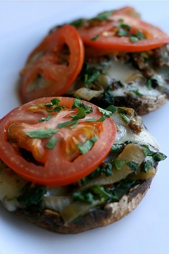 Grilled portobellos stuffed with sausage, spinach and mozzarella