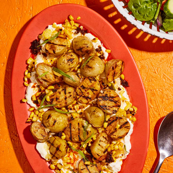 Grilled potato salad with labneh, sweetcorn, chilli oil and tarragon