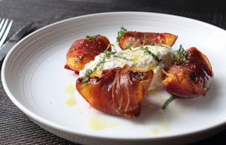 Grilled prosciutto-wrapped peaches with burrata and basil