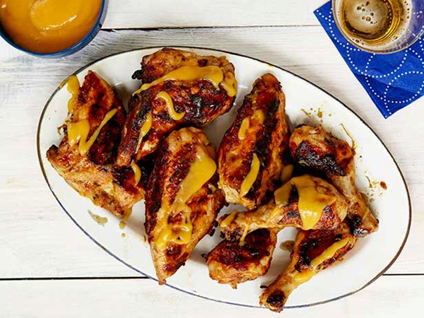 Grilled red chile-buttermilk brined chicken with spicy mango-honey glaze