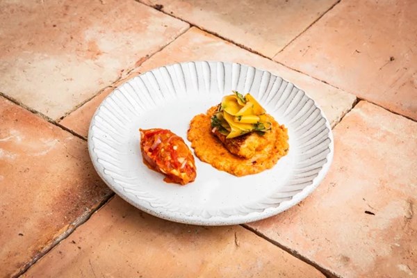Grilled red snapper with Creole sauce, Seychellois pickled mango and chilli salad