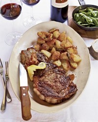 Grilled rib-eye steaks with roasted rosemary potatoes