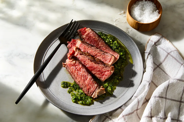 Grilled rib eye with charred chimichurri from Hugh Mangum