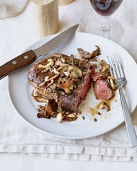 Grilled rib eyes with mushrooms and fish sauce