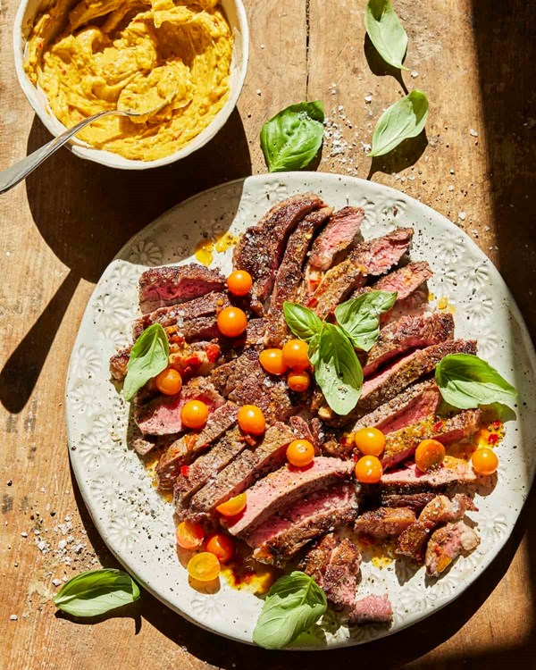 Grilled ribeyes with Calabrian chile butter