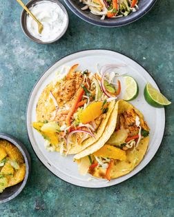 Grilled rockfish tacos with citrus salsa and cabbage slaw