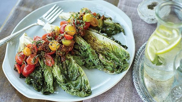 Grilled romaine hearts with rustic cherry tomato vinaigrette