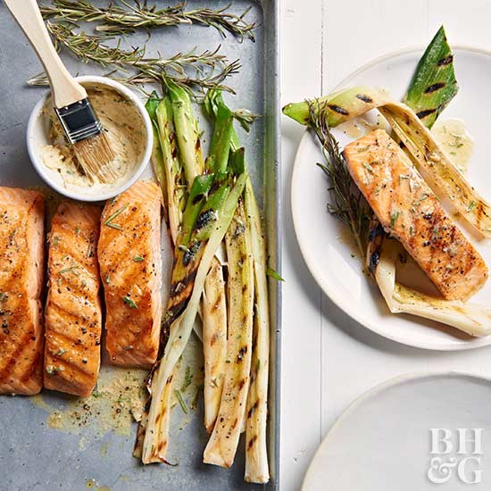 Grilled salmon and leeks with rosemary-mustard butter