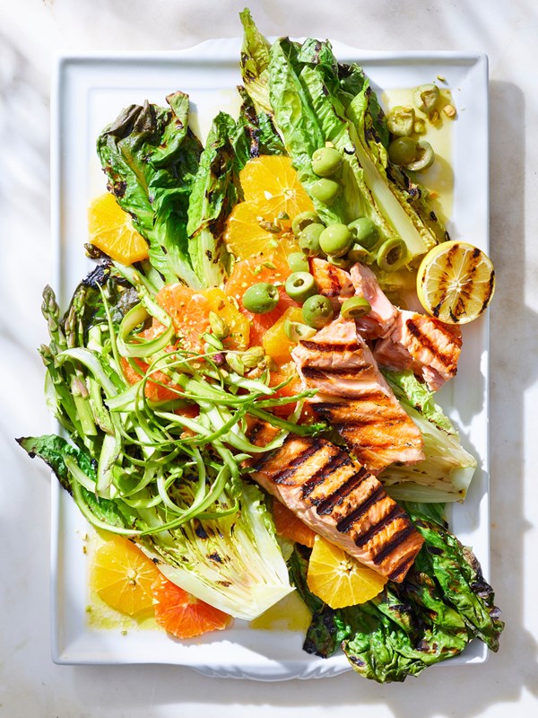 Grilled salmon and romaine salad with oranges and olives