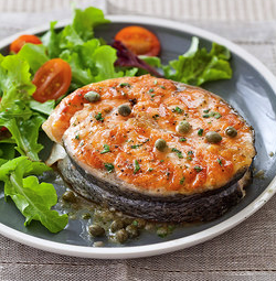 Grilled salmon steaks with lemon-caper sauce