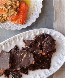 Grilled salmon with almond tarragon romesco
