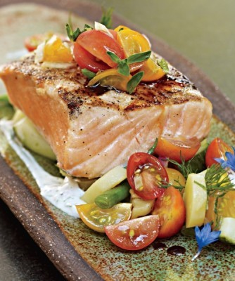 Grilled salmon with cucumber-yogurt sauce and warm potato-vegetable salad