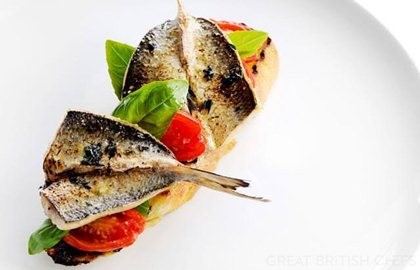 Grilled sardines on ciabatta with tomato confit, basil and tapenade