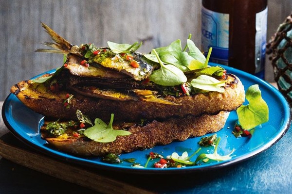 Grilled sardines on toast with salmoriglio