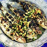 Grilled sardines with a lemon oil, pine nut, herb and 'seawater' dressing 
