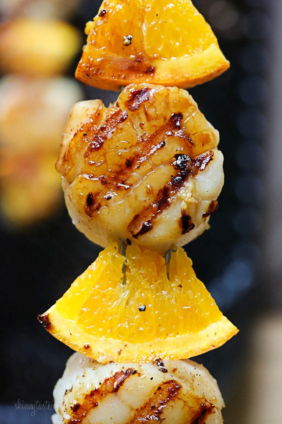 Grilled scallop and orange kebabs with honey-ginger glaze