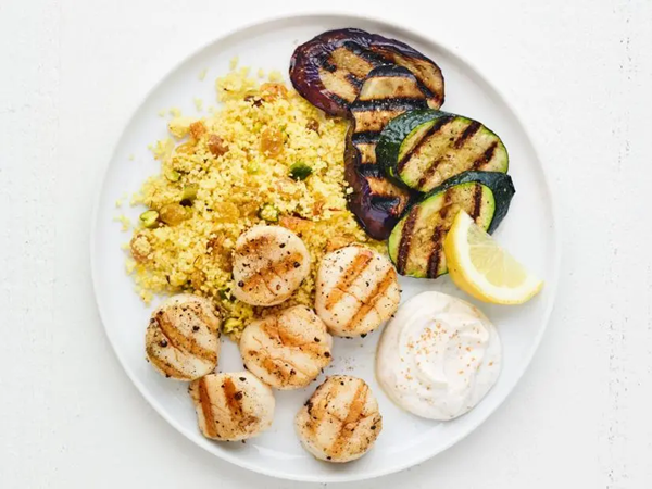 Grilled scallops, eggplant and zucchini with couscous