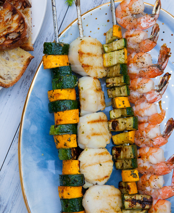 Grilled scallops, shrimp and zucchini with basil vinaigrette