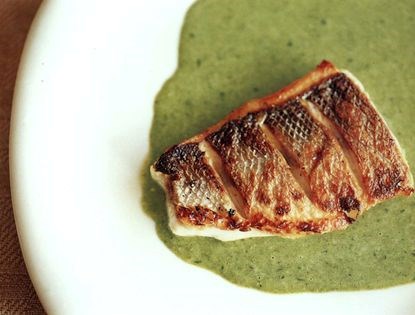 Grilled sea bass with basil and crème fraîche