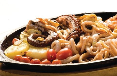 Grilled seafood with spicy anticucho sauce