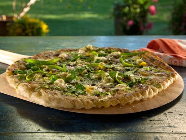 Grilled shaved asparagus pizza with robiola and parsley oil