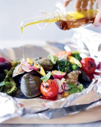 Grilled shellfish and vegetables al cartoccio