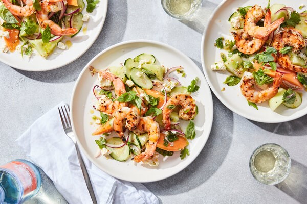 Grilled shrimp salad with melon and feta