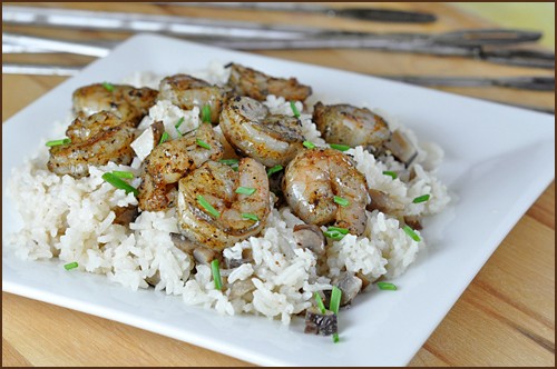 Grilled shrimp with brown buttered rice and mushrooms