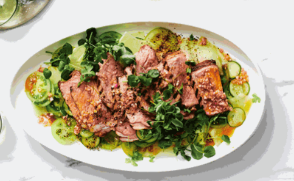 Grilled sirloin with harissa butter, green tomato and melon salad