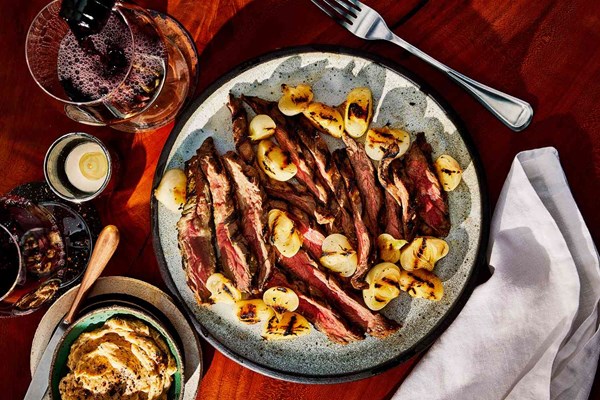 Grilled skirt steak and cipollini onions with Meyer lemon-nori butter