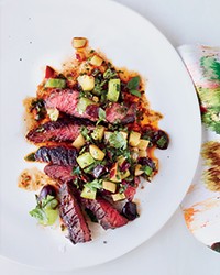 Grilled skirt steak with fruit-and-green tomato salsa