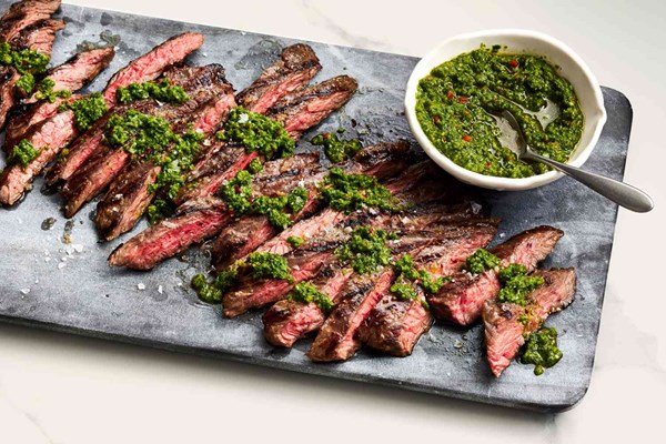 Grilled skirt steak with mustard greens chimichurri