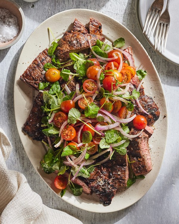 Grilled skirt steak with tomato salad