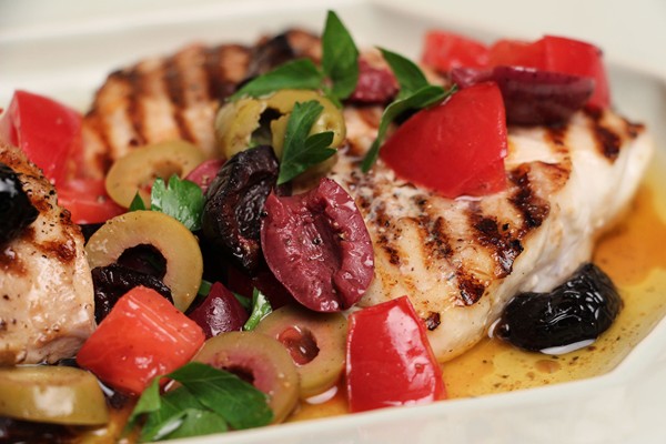 Grilled snapper with olive topping