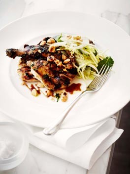 Grilled spatchcock with pear and cabbage salad, hazelnuts and sherry