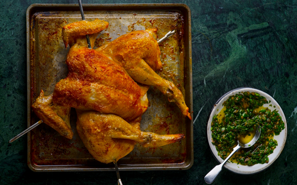 Grilled spatchcocked chicken with green sauce