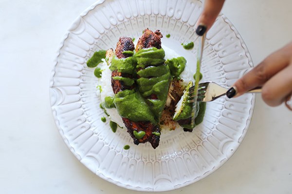Grilled spiced chicken and asparagus with parsley-mint sauce