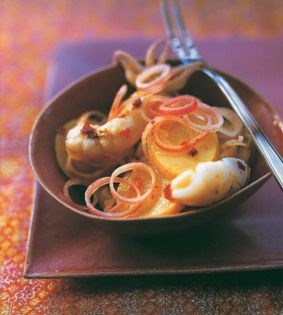 Grilled squid with chilli-pickled potatoes and shallots