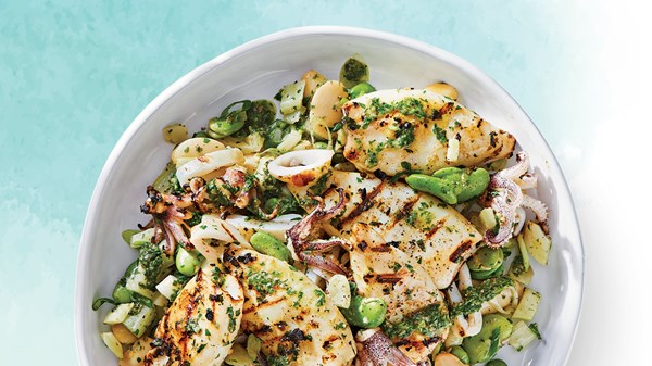 Grilled squid with marinated gigante beans, favas, and salsa verde